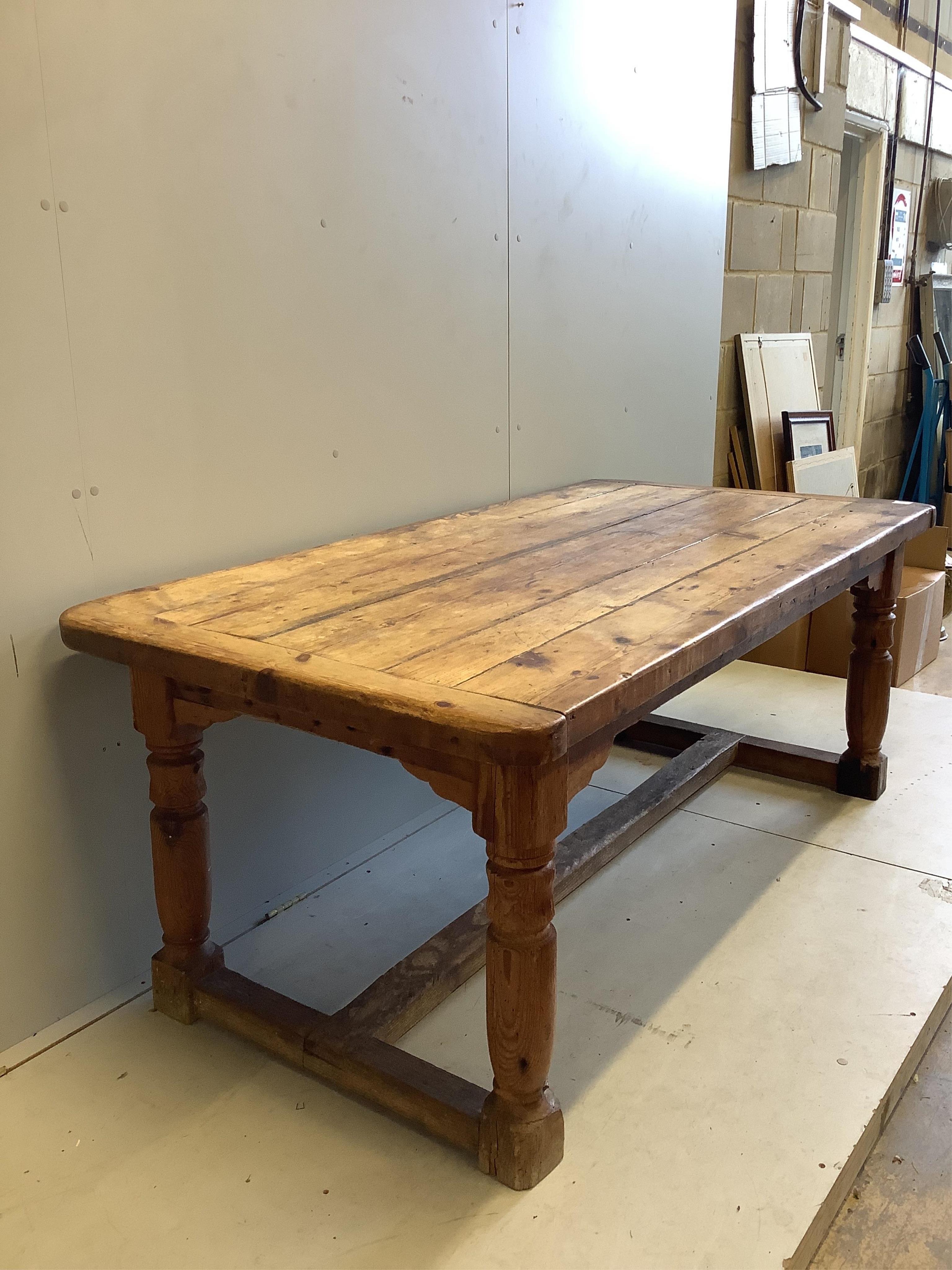 An 18th century style rectangular pine refectory table, width 180cm, depth 90cm, height 72cm. Condition - fair